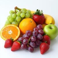 Colorful assortment of fresh fruits on a white surface photo
