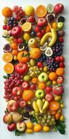Colorful arrangement of assorted fruits on a white background photo