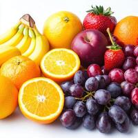 Fresh fruit assortment featuring bananas, oranges, grapes, and strawberries photo
