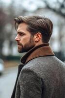 Stylish man with well-groomed hair and beard walk in urban setting photo