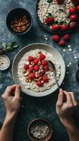 Delicious breakfast bowl with oats, fresh raspberries, and almonds photo