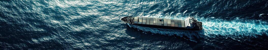 Ship navigating through vast ocean waters during daylight hours photo
