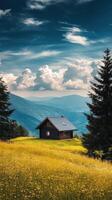 Scenic hillside cabin surrounded by lush greenery and mountains photo