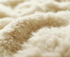Soft white wool texture close-up showing intricate fibers and patterns photo