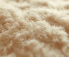 Soft wool texture showcasing natural fibers in warm color tones photo