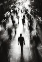 Mysterious figures moving through a rain-soaked urban street at night photo