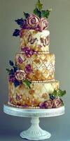 Elegant three-tier cake adorned with flowers and butterflies for a celebration photo