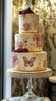 Elegant three-tier cake with floral and butterfly accents for celebrations photo