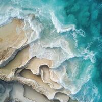 Waves crashing on sandy cliffs creating a beautiful coastal landscape photo