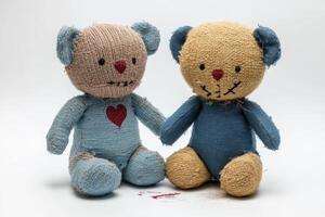 Two handmade plush teddy bears sitting together in a cozy setting photo