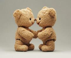 Cute teddy bears holding hands and looking at each other with affection photo