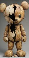 Unique cracked teddy bear sculpture showcases vintage charm and artistry photo