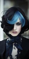 Unique hairstyle with black and blue colors on model with intense makeup photo