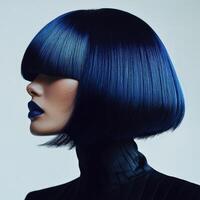 Stylish woman showcasing a dramatic blue bob hairstyle in a modern studio photo