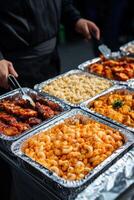 Delicious array of dishes at a festive food event in the evening photo