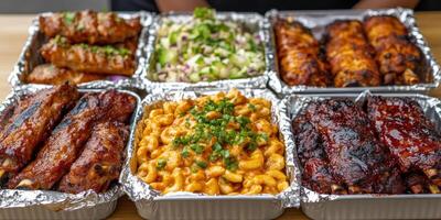 Delicious barbecue spread featuring ribs, chicken, mac and cheese, and sides photo