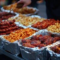 Delicious variety of grilled meats and sides served at street food festival photo