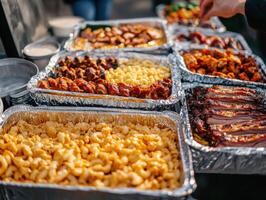 Delicious array of barbecue dishes at outdoor food event in autumn photo