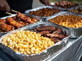 Delicious barbeque feast featuring ribs, mac and cheese, and more photo
