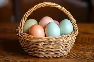 Wicker basket holding fresh multicolored eggs on rustic wooden table photo