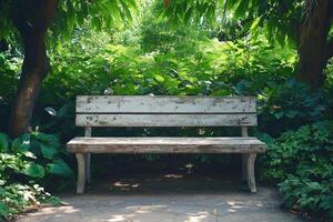 Old wooden bench inviting visitors to relax in lush green park photo