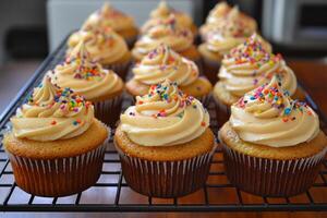 A rack with cupcakes on it photo