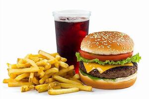 A hamburger and fries with a drink on a white background photo