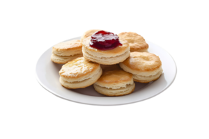 Plate of freshly baked biscuits with red jam on a transparent background png
