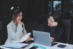 Team of business people are meeting to analyze data for marketing plan,Market research reports and income statistics, Financial and Accounting concept. photo