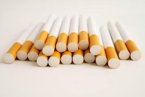 Cigarette, roll tobacco in paper with filter tube, No smoking. photo