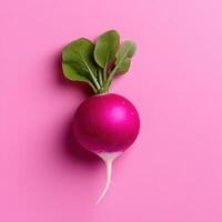 Bright purple radish with smooth surface and green leaves photo