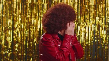 Nosy curious woman closing eyes with hand and spying through fingers, hiding and peeping, exploring video
