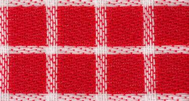 Red and white checkered fabric as a background photo