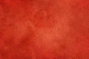 Red suede macro photo as background.