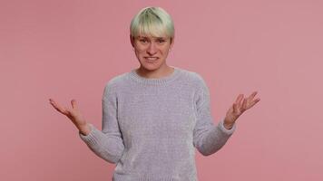 Woman raising hands in indignant expression ask why what reason of failure demonstrating disbelief video