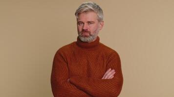 Displeased upset senior man reacting to unpleasant awful idea, dissatisfied with bad quality, No video