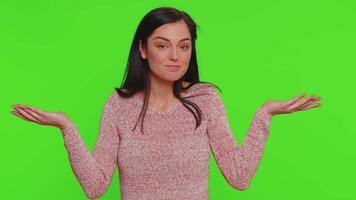 Confused woman feeling embarrassed about ambiguous question having doubts no idea clueless uncertain video