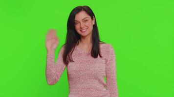 Woman showing inviting gesture with hands, ask to join, beckoning to coming, gesturing hello goodbye video