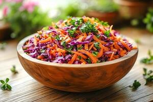 Spring vegetable salad with grated carrots and shredded purple cabbage. photo