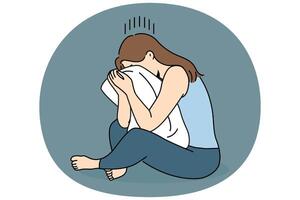 Crying woman sits hugging pillow and suffers because of breaking up with boyfriend vector