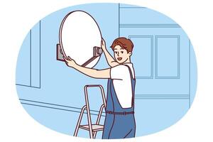 Master installs television satellite dish on facade of building standing on stepladder vector