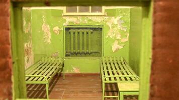 Vilnius, Lithuania - 30th november, 2024 - kgb underground prison cells with bunk beds. The Museum of Occupations and Freedom Fights in Vilnius. Soviet occupation of Lithuania video