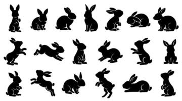 Set of rabbits silhouette in different poses. Hand drawn black silhouettes of easter bunnies isolated on white background. Illustration of decorative elements for design decor. vector