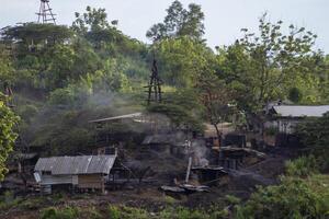 Teksas Wonocolo mining, a petroleum geoheritage located in Bojonegoro, East Java, Indonesia. This place offers views of old oil mining wells managed by the community in a traditional way. photo