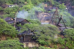 Some rustic building at Teksas Wonocolo, a petroleum geoheritage located in Bojonegoro, East Java. This place offers views of old oil mining wells managed by the community in a traditional way. photo