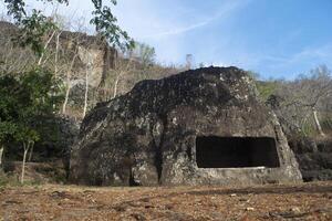 Selomangleng Cave is a cultural heritage of an artificial cave which is estimated to have been made in the 10th century at the beginning of the Majapahit kingdom in Tulungagung, East Java. photo