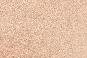 Yellow stucco texture. Designer interior background. Abstract architectural surface. photo