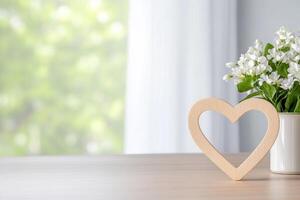 Photo frame of heart shape for mockup design on light table background.
