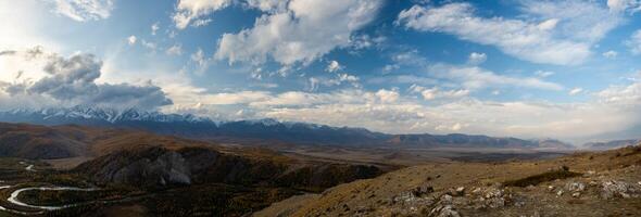 Panorama is Altai, a mountain river flowing between the Altai mountains and the nature of the area. photo
