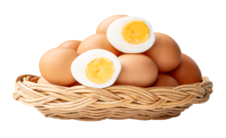 Large group of raw brown chicken eggs and peeled cooked or boiled eggs with egg yolk in halves in stack in wicker basket isolated with clipping path in file format png